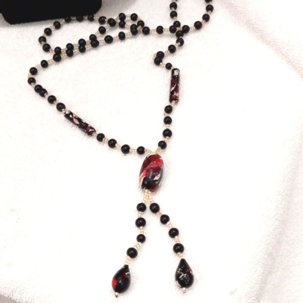 Seed Beads and Black painted plastic & smaller black beads